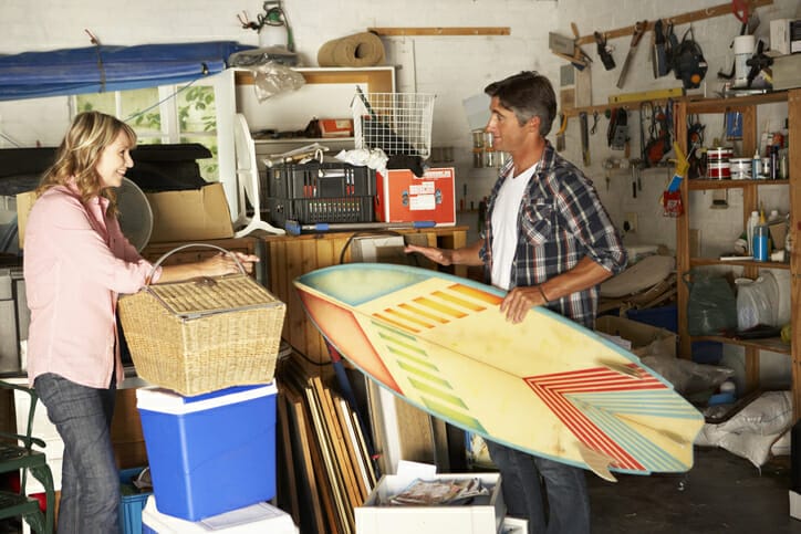 man holding surfboard