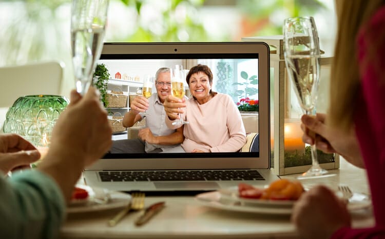 man and woman holding champagne